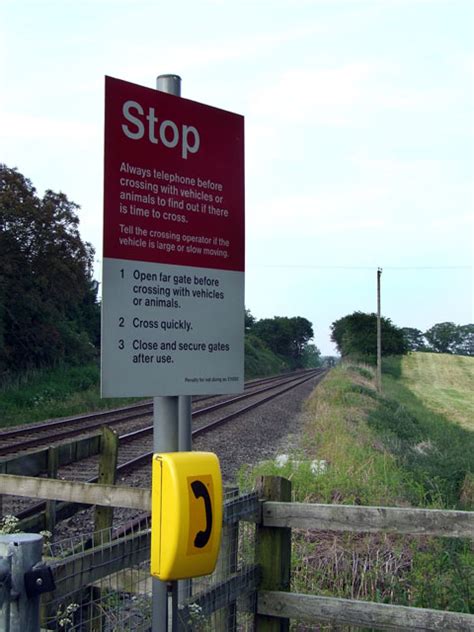 Warning sign at level crossing © Nigel Williams :: Geograph Britain and Ireland