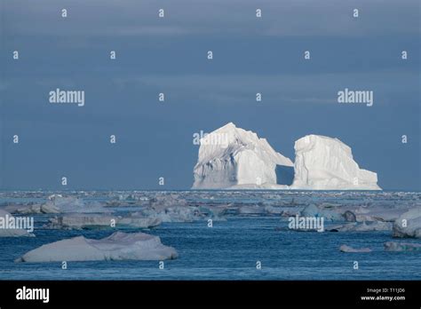 Antarctica, below the Antarctic Circle. Ice filled bay in the ...