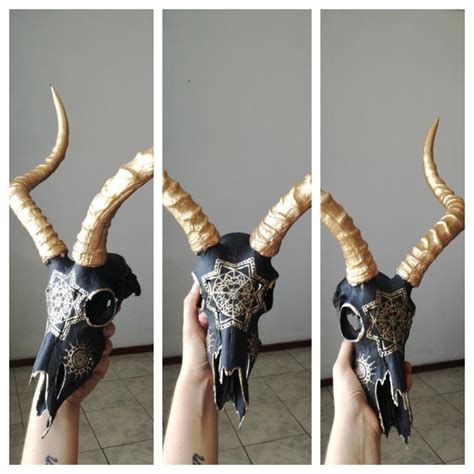 Painted Impala antelope skull black and gold. Animal skull art