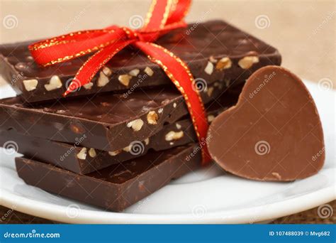 Chocolate Bars with Nuts and Chocolate Candy in Shape of Heart Stock Image - Image of heart ...