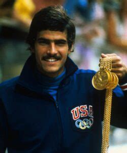 Mark Spitz Holding Five Gold Medals | WeAquatics - Swim Program