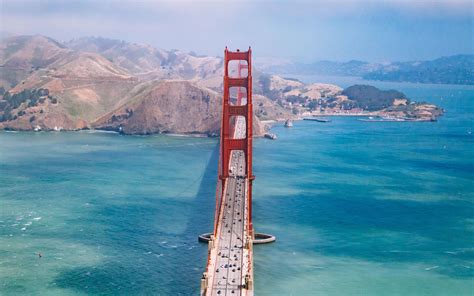 aerial view photography of Golden Gate Bridge duri Mac Wallpaper Download | AllMacWallpaper