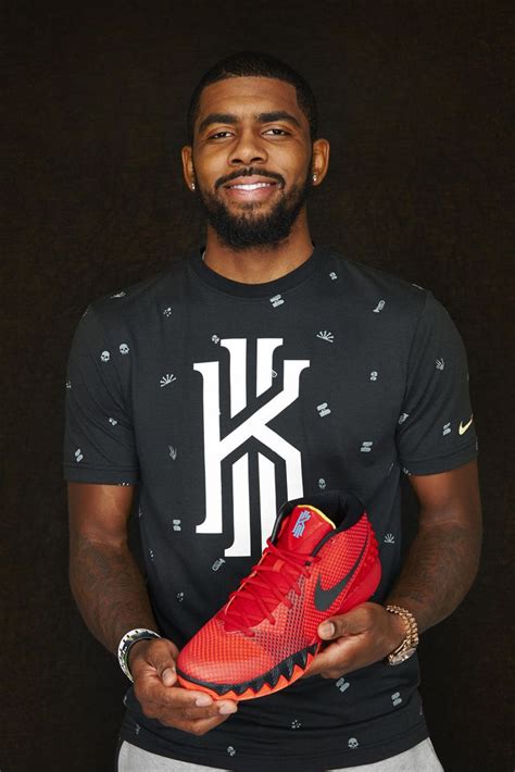 NBA superstar Kyrie Irving with his first Nike signature shoe KYRIE 1 in the global release ...