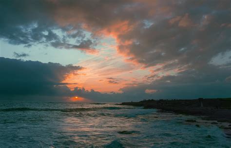 Seaside City at Sunset · Free Stock Photo