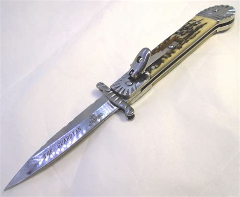 Sold Price: AUTOMATIC SWITCHBLADE KNIFE LEVER ACTION GUARDIAN - Invalid date EST