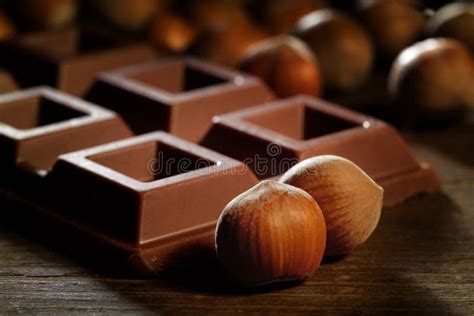 Milk Chocolate Bar with Hazelnuts Stock Image - Image of melting ...