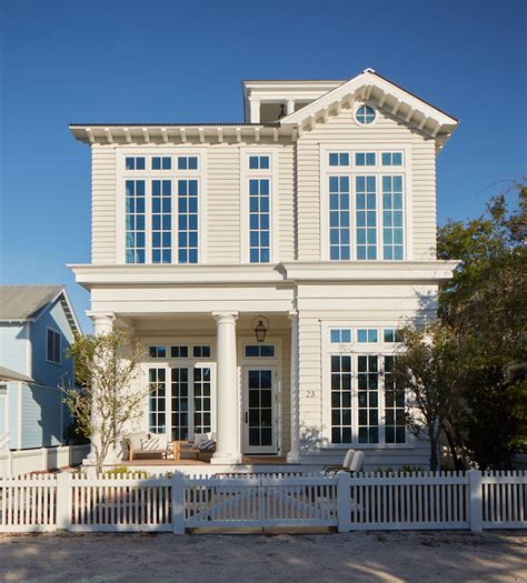 Cream House with White Doric Columns - Cottage - Home Exterior White House Exterior Colors ...