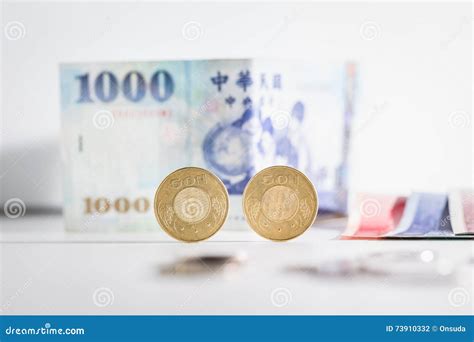 50 Taiwan Dollar Coins and Banknotes Stock Photo - Image of white, money: 73910332