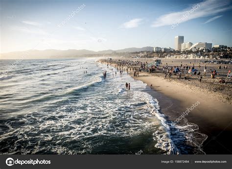 Santa monica beach at sunset time — Stock Photo © oneinchpunch #158872484