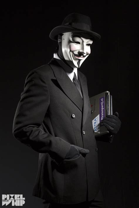 MAN IN anonymous mask in business suit | A shot of a man dre… | Flickr