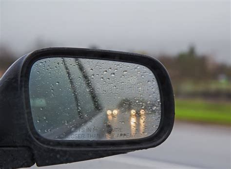 Driving in Rain with Side Mirror in Drops Stock Photo - Image of ...