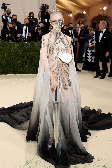 Grimes Brings a Sword to the 2021 Met Gala Red Carpet