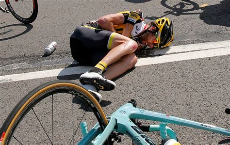 Cyclist dislocates shoulder in a massive Tour de France crash, still finishes stage | Business ...