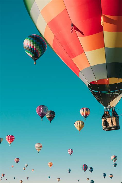 HD wallpaper: hot air balloons under blue sky, people riding hot air balloons in the sky ...