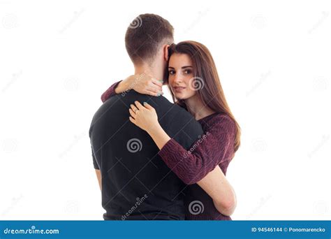 Beautiful Young Girl Hugs with a Guy in the Studio Isolated on a White Background Stock Photo ...