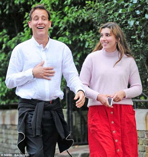 Clive Owen enjoys some quality time with daughter Eve, 19, as they watch the England World Cup ...