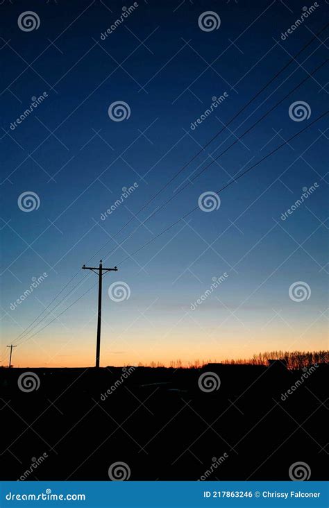 Dusk sky colors stock photo. Image of streetlight, tower - 217863246