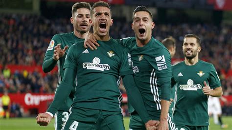 Real Betis players celebrate as they beat Sevilla 5-3 in the Andalucian derby in La Liga : r ...