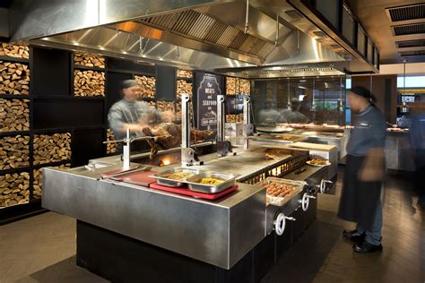 A customized grill with 3 -separate grilling sections for seafood ...