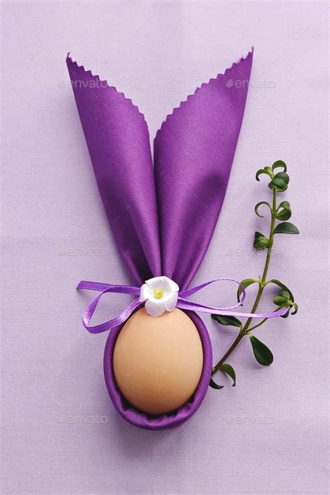 Easter Bunny Ears with eggs for table decoration to Celebrate Easter, flat lay Stock Photo by ...