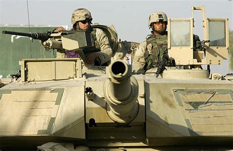 Crew members of US M1 Abrams Tank of Del Pictures | Getty Images