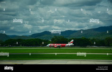 Chiang Mai, Thailand - Jun 22, 2016. AirAsia aircraft at Chiang Mai Airport in Northern Thailand ...