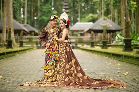 Photo of Man and Woman Wearing Brown Floral Dress · Free Stock Photo