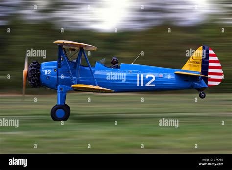 Boeing Stearman biplane taking off Stock Photo - Alamy