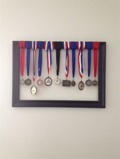 Ways to display medals | Medal display, Trophy display, Hanging medals Trophy Display, Award ...