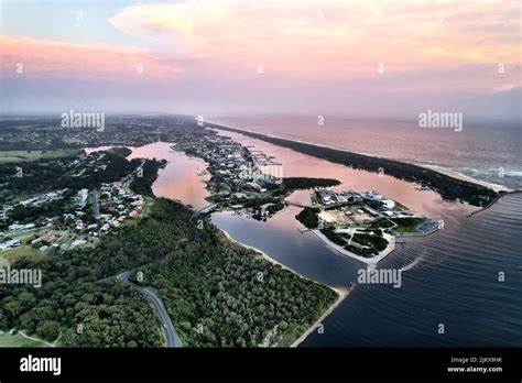 An aerial breathtaking view of buildings on a coral beach Stock Photo - Alamy