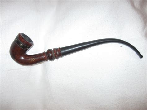 Antique long stem tobacco pipe. | Collectors Weekly