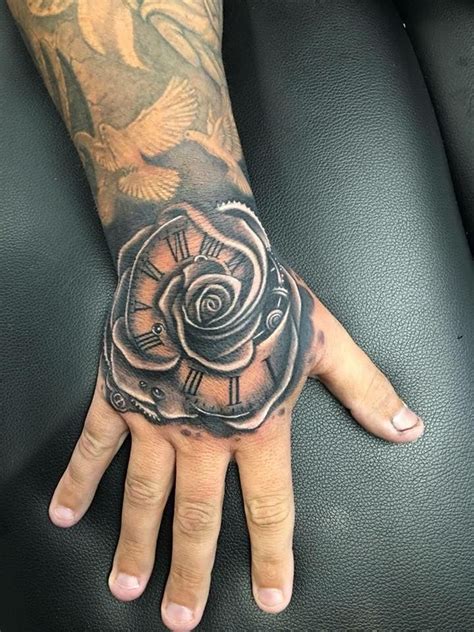 Dollar rose tattoo by Greg! Limited appointments at Revival Tattoo Studio. | Rose hand tattoo ...