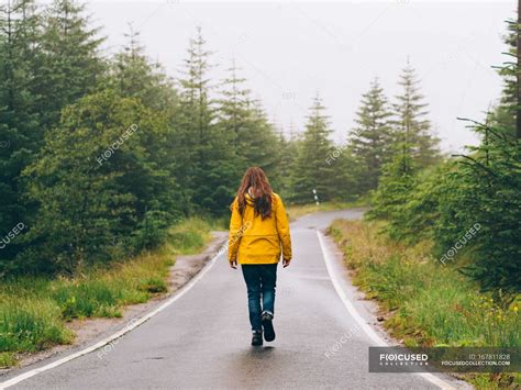 Girl walking forest road — beautiful, color - Stock Photo | #167811828