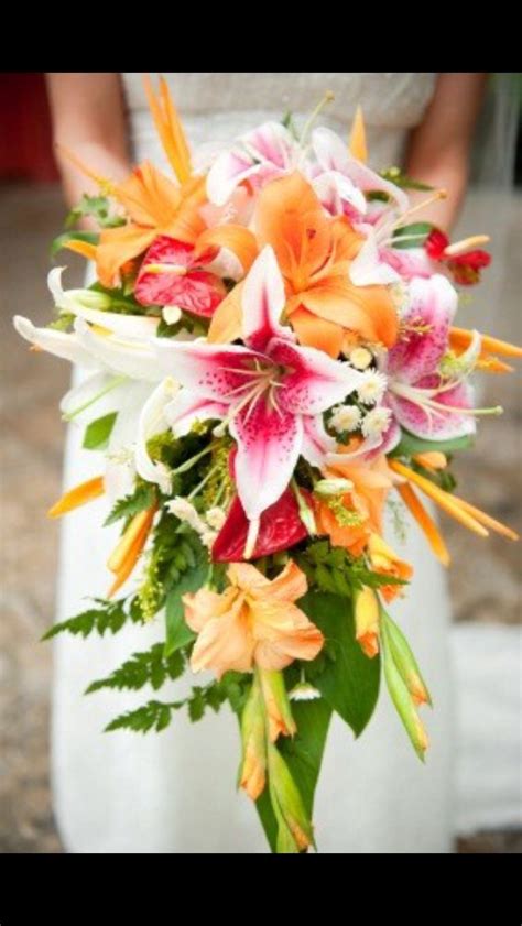 Coral waterfall bouquet | Tropical wedding bouquets, Wedding flower ...