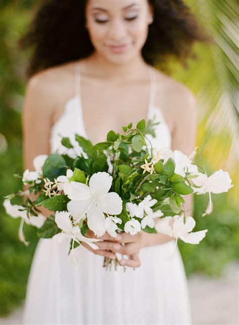 A Hibiscus Bouquet + Palm Frond Motif Are the Epitome of Summer | Greenery wedding bouquet ...