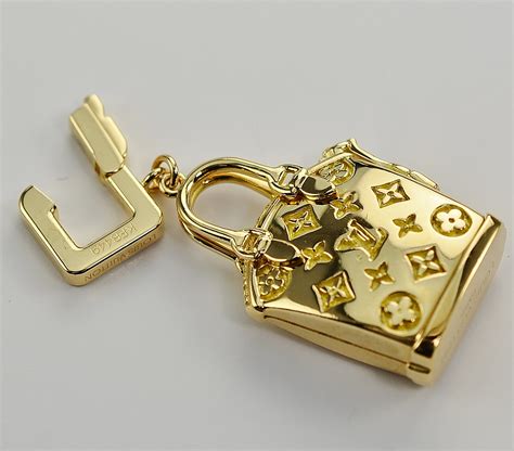 Louis Vuitton Solid 18K Gold Charm Bracelet with Purse Charm 3.80 Ounces Solid 18K Gold ...