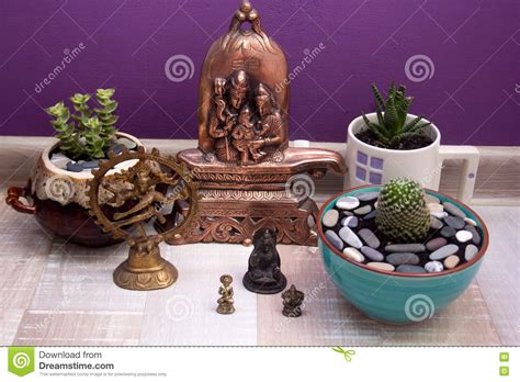 Statues of Hindu Gods and Succulents in Ceramic Pots Stock Image ...