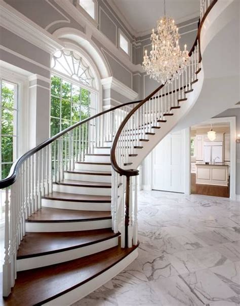 This is a traditional floating staircase with a combination of wood and ...