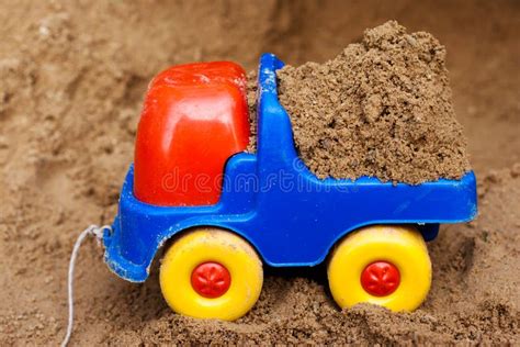 Toy truck with sand stock image. Image of childhood, summer - 32594075