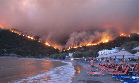 Chios forest fire: Residents flee from villages as firefighters battle massive wall of flames on ...