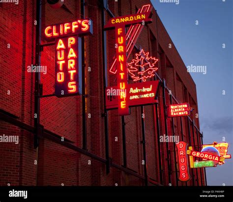 The electric neon signs of the outdoor Neon Sign Museum in Edmonton, Alberta, Canada Stock Photo ...