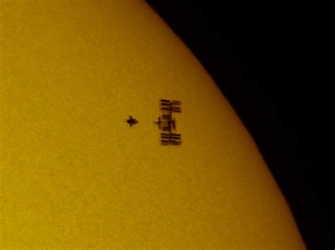 Incredible Image: Atlantis and ISS Transit the Sun - Universe Today