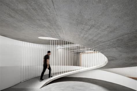 Paulo Merlini Architects Joins Two Buildings With a Sculptural Ramp ...