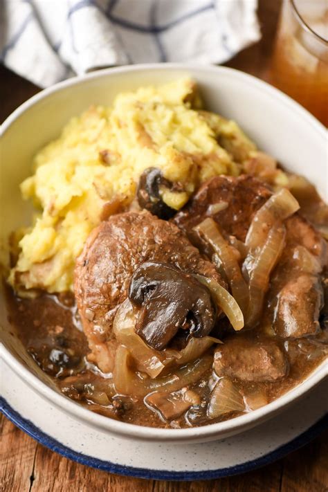 This Crock Pot Round Steak with rich onion and mushroom gravy is the ...