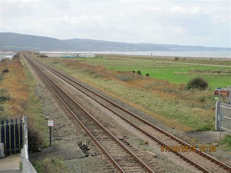 Abergele Towyn Beach - Photo "Towyn sea wall looking westwards" :: British Beaches