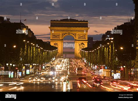 France Europe Paris Champs Elysees Arc de Triomphe triumphal arc traffic at night night Stock ...