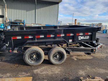 Two Dogs Fabricating LLC. - Delco Trailers, Dump Trailer