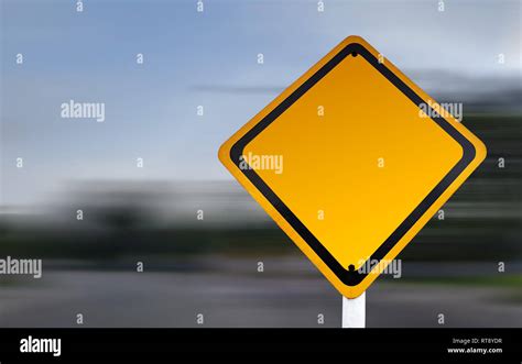 Blank yellow road warning sign with copy space and speed blur background. Caution sign template ...