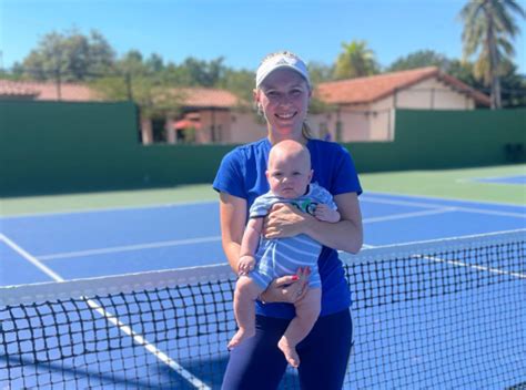 Caroline Wozniacki takes four-month-old baby boy James to tennis court