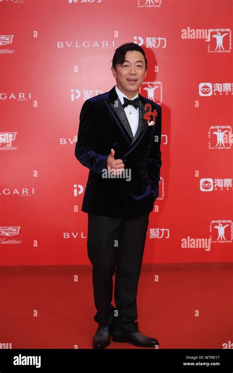 Chinese actor Huang Bo arrives on the red carpet for the closing ...